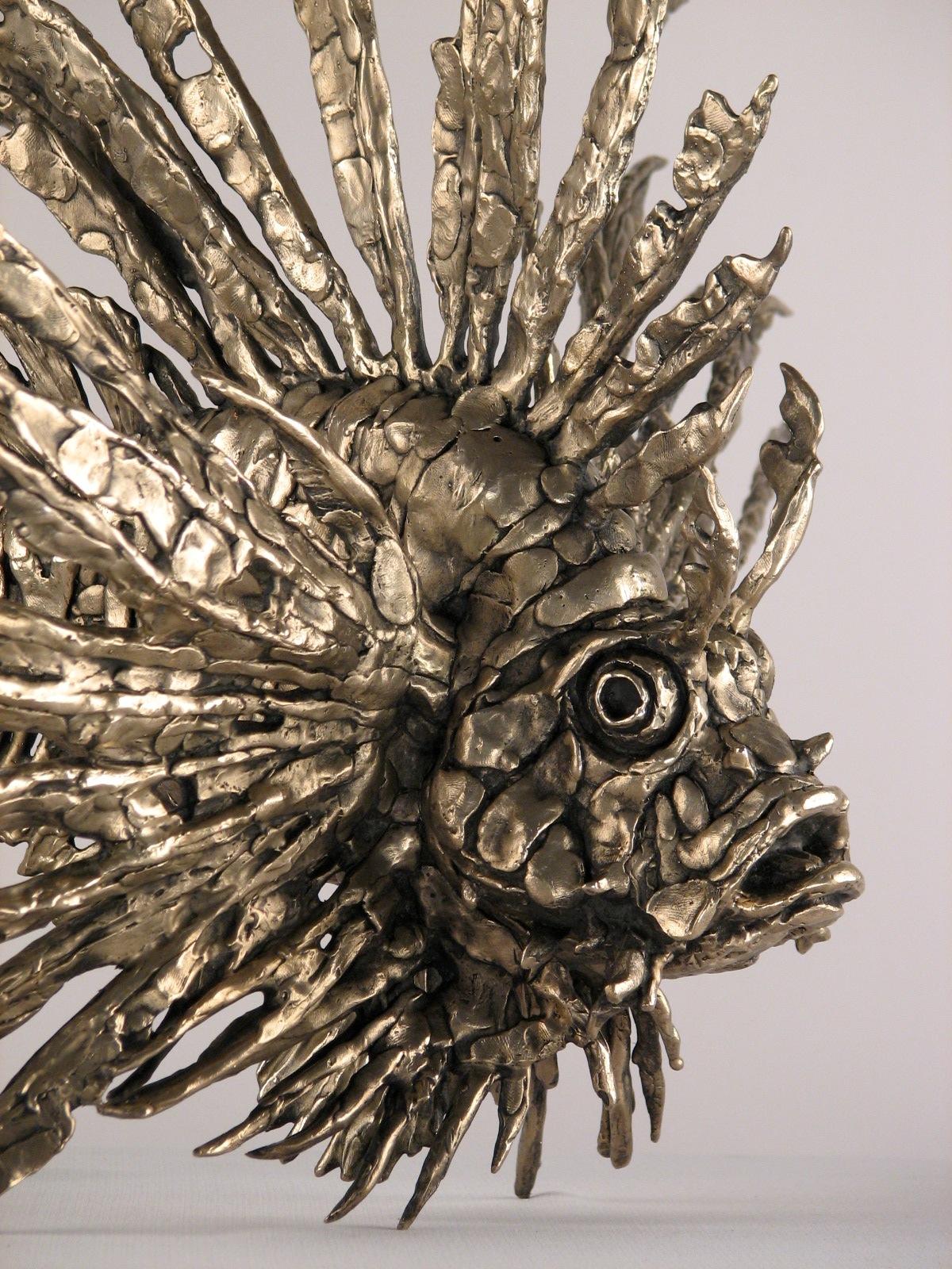 Angel Fish bronze sculpture, Limited Edition of/12 signed , Table top. The many pieces of bronze branching off from the body of the fish make this sculpture extremely interesting and complex. 

Andrzej graduated with an MA degree in Fine Arts in the