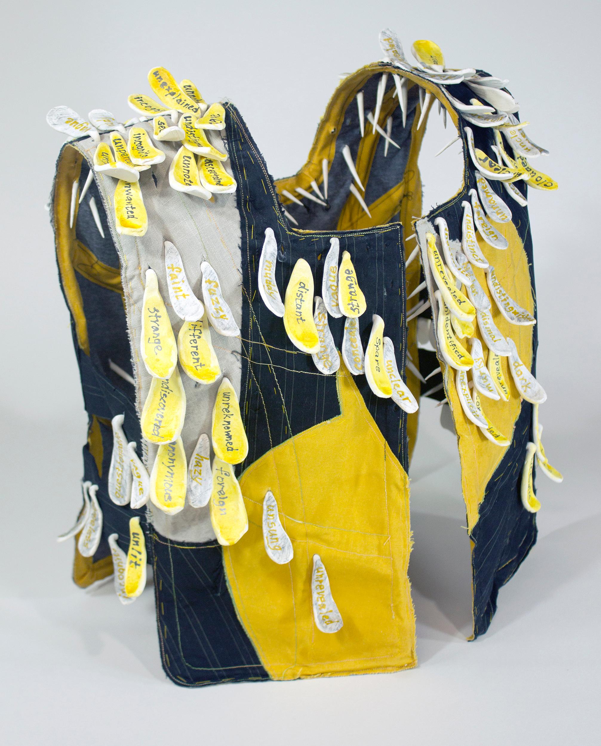 "Caution", ceramic, vest, black, bright, yellow, mixed media, sculpture