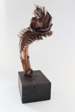 "Ascending Flourish", sculpture, wood, mountain laurel, feather, browns, reds