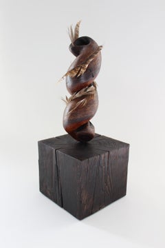 "Silent Whirlabout", sculpture, wood, white oak, feather, browns, ivories, reds