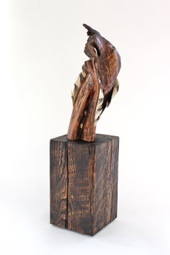 "Twisting Reverie", gestural, wood, feather, browns, reds, sculpture