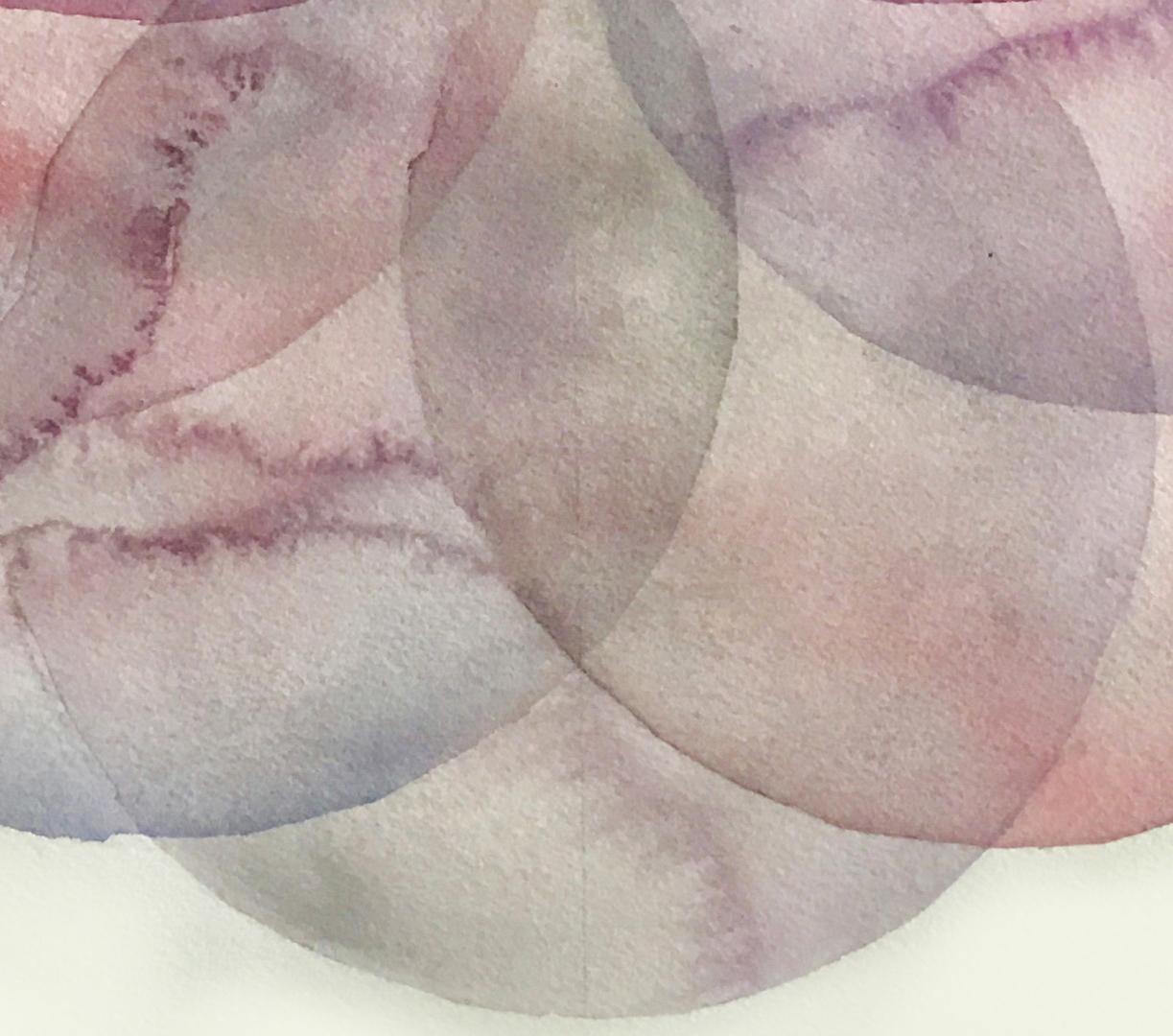 Clare Asch’s “Convergence 12” is part of her series of watercolors consisting of overlapping, transparent circles that explore the interaction of geometry vs. spontaneous paint and gesture. The colors of this painting are made up of pearly, pink