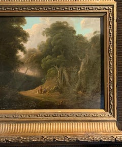 18th century English tree lined landscape with a pathway with figures resting.