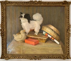 French 19th century portrait of a Papillon dog with its toys, books and basket.