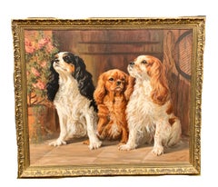 20th century English oil Portrait of three King Charles Cavalier Spaniels.