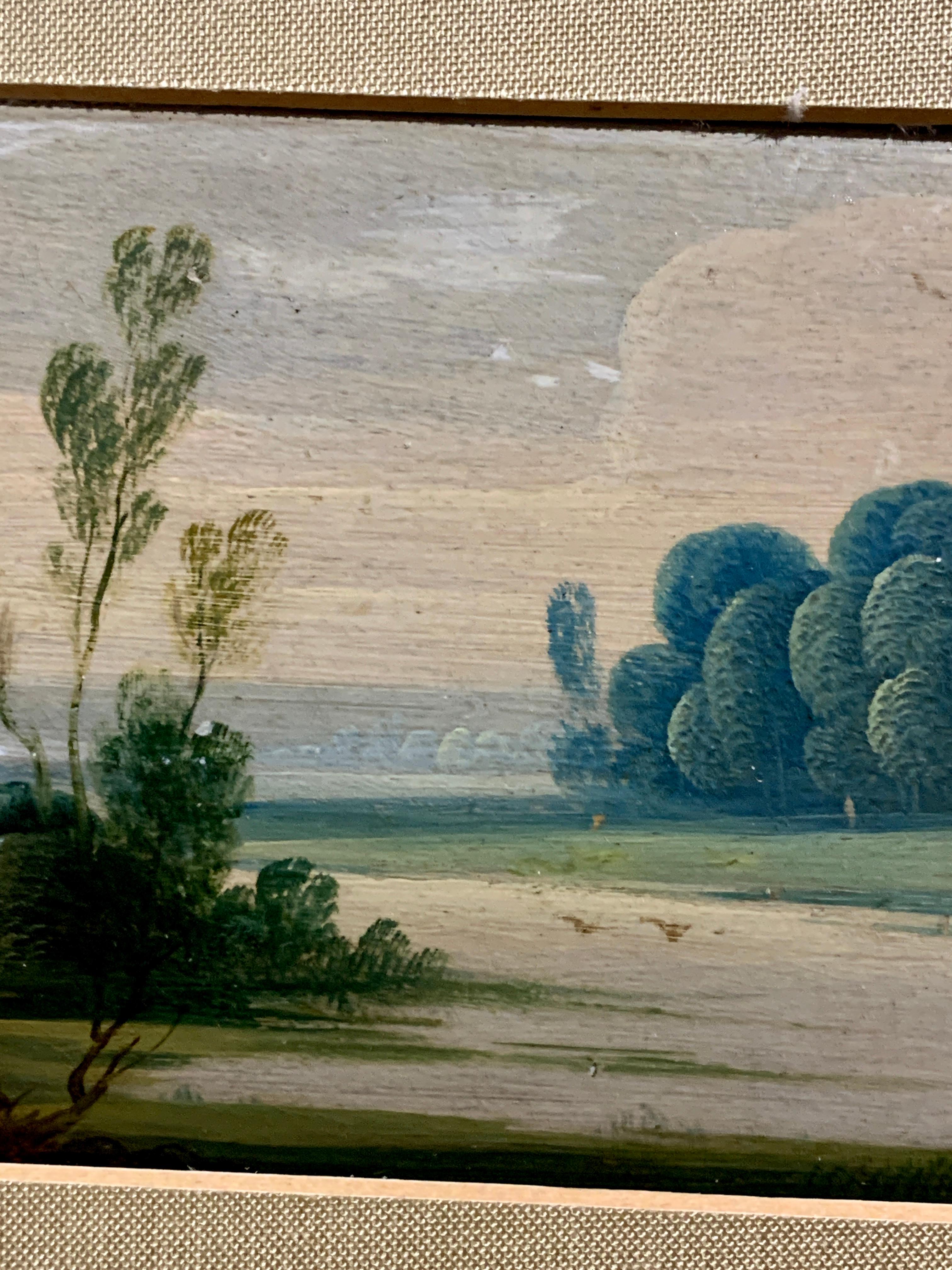Wonderful pair of Flemish or Dutch old master style landscapes with figures.

Possibly taken from a cabinet or piece of furniture this pair of paintings are very decorative and typical of the Flemish school from the 17th  and 18th
