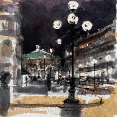 La calle de París de noche con la luz de las lámparas y la Ópera del Palais Garnier