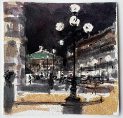 Rue de Paris la nuit à la lumière des réverbères et de l'opéra du Palais Garnier