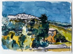 Paysage de colline de Provence avec ferme et crête lointaine Campagne française