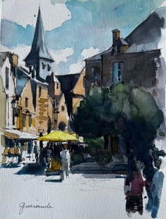 Figures de la flèche de l'église de la place du marché de Guérande et parasol jaune