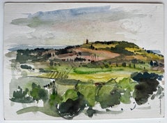 Rollle Hille de Provence avec tour lointaine et champs verdoyants Paysage français