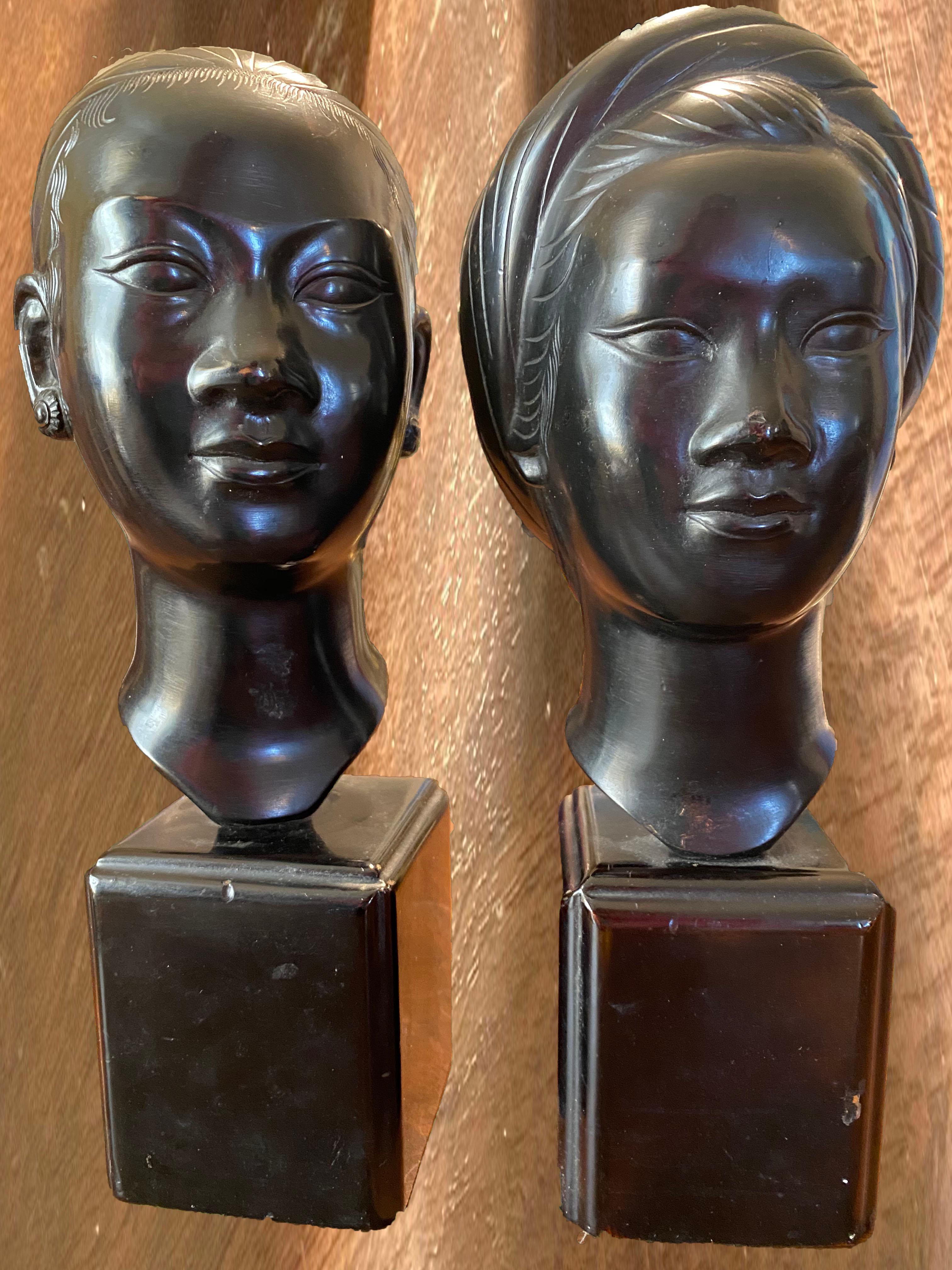 Two bronze busts of girls