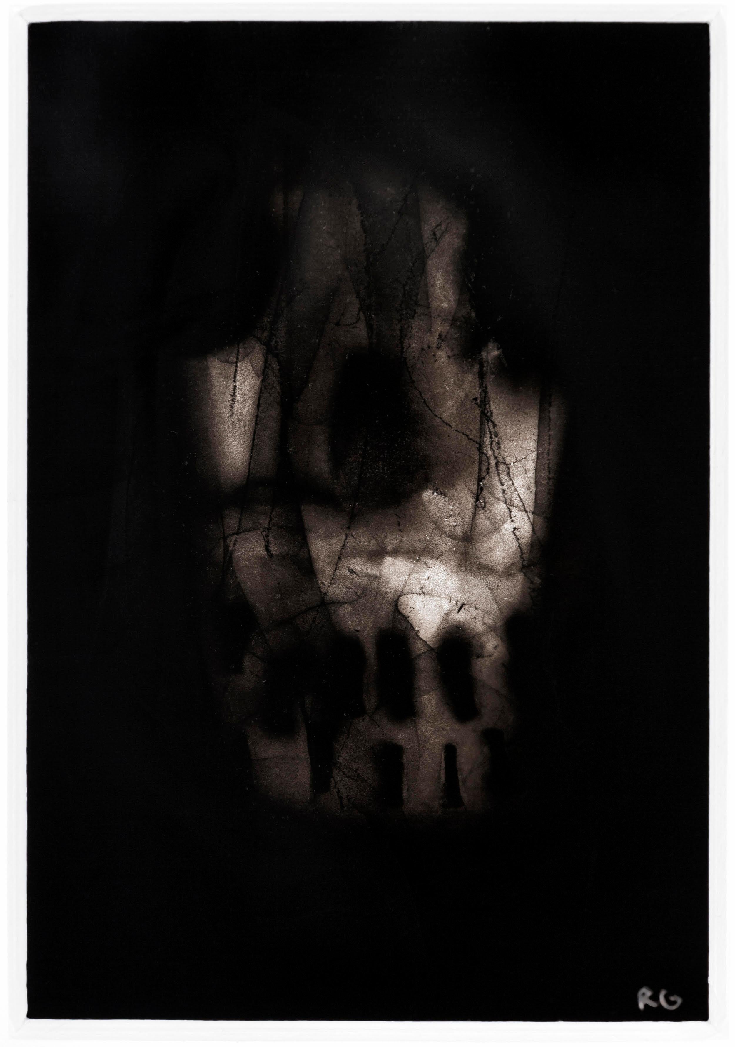 Skull is a black flame drawing on paper. The artist uses a flame from a torch with precise speed and distance from the paper, which leaves carbon deposits behind in varying degrees of value and rich velvety blacks. The process provides a shadowy