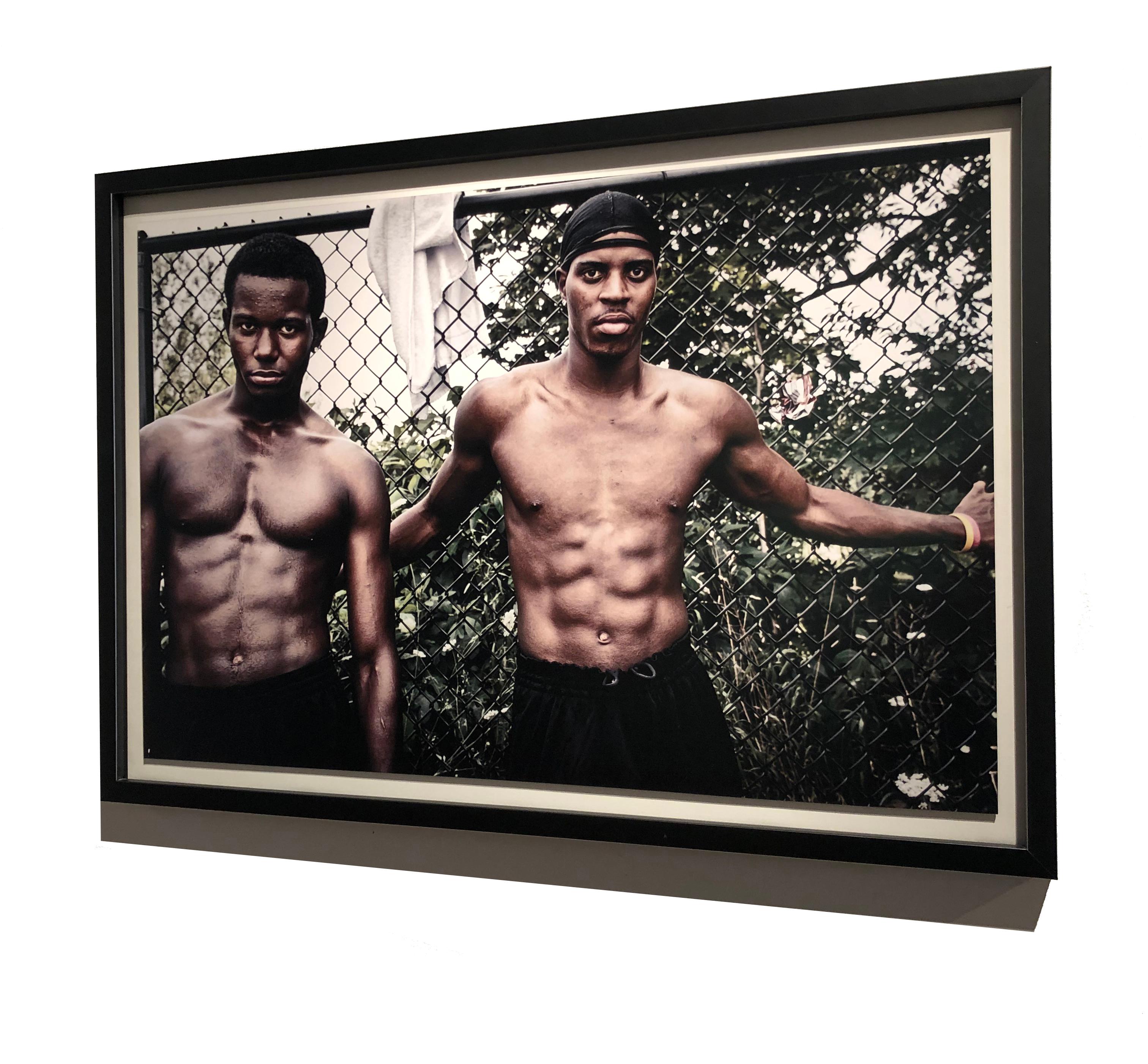 Street photography two young men, Ever Onward I, No. 22, C Print - Black Portrait Photograph by Tice Lerner