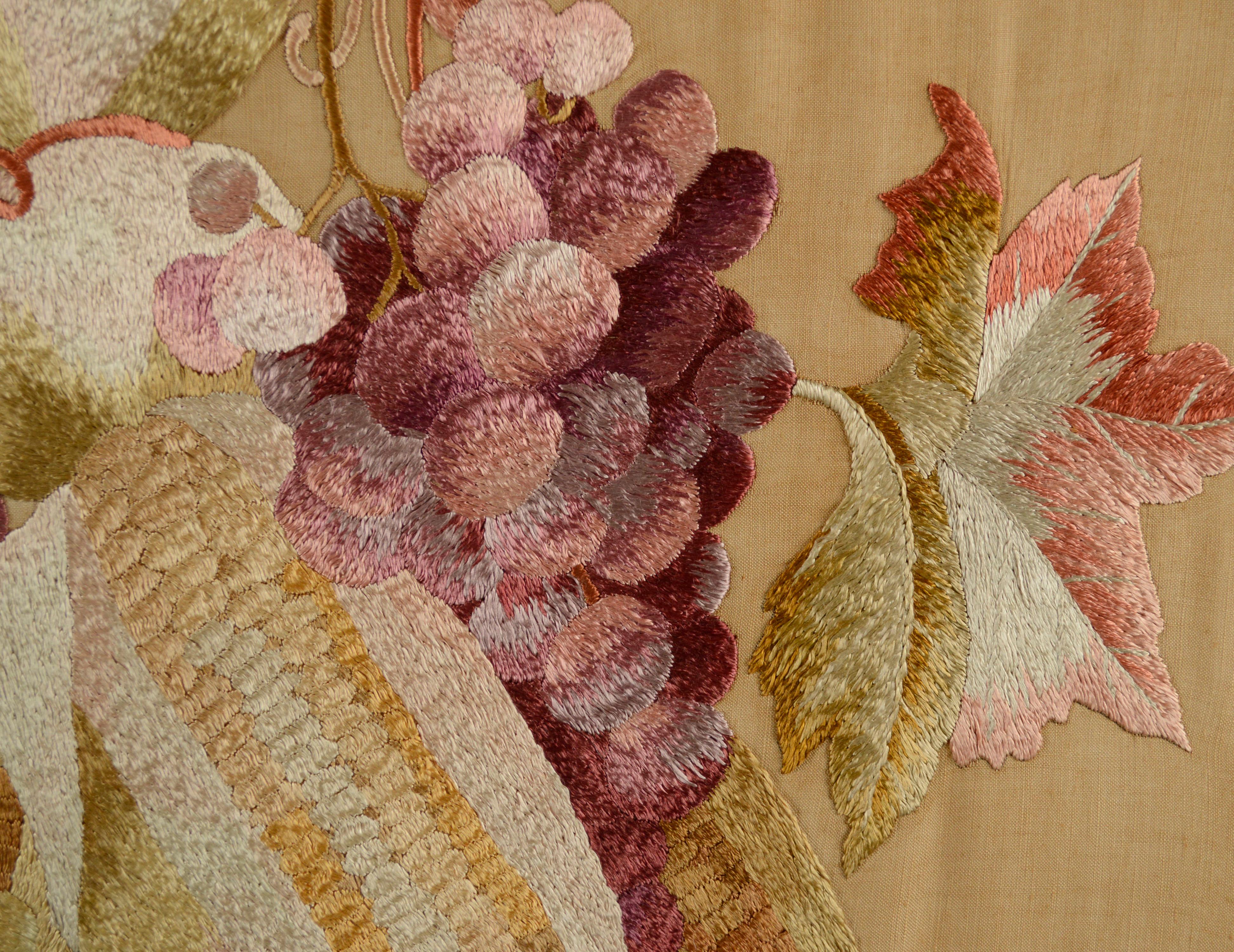 Embroidered Fruit Still Life

A beautiful embroidery of a colorful grape vine with rich colors of red, purple and blue. Signed 