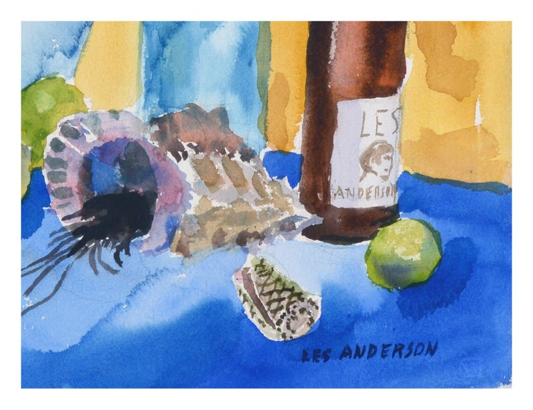 Whimsical still life of various shells, fruit, and bottles, including a wine bottle with a label stating the artist's name and crude self-portrait, by Les (Leslie Luverne) Anderson (American, 1928-2009). From the estate of Les Anderson in Monterey,