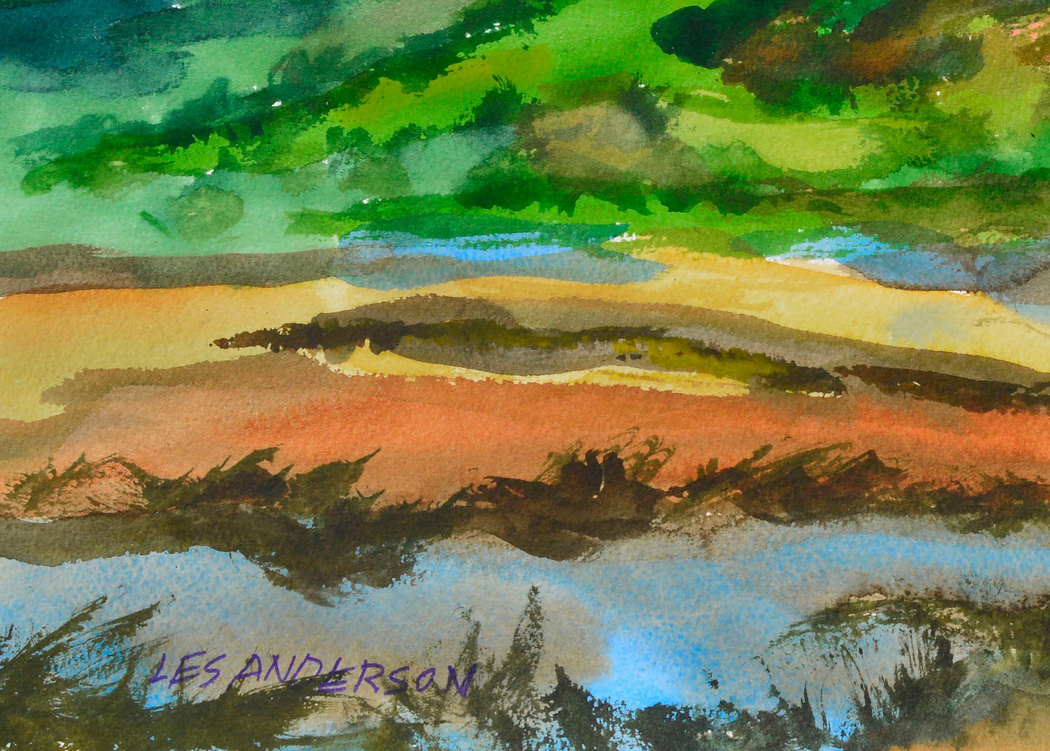 Paysage coloré en aquarelle d'un lac entouré de montagnes par l'artiste californien Les (Leslie Luverne) Anderson (américain, 1928-2009). De la propriété de Les Anderson à Monterey, Californie. Non encadré. Signé 