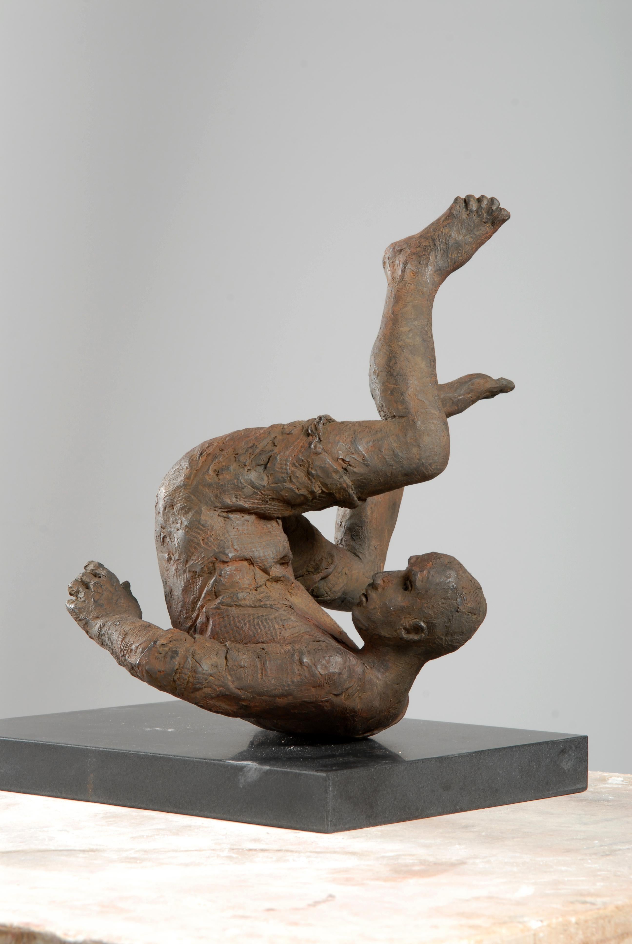 tumbling woman sculpture