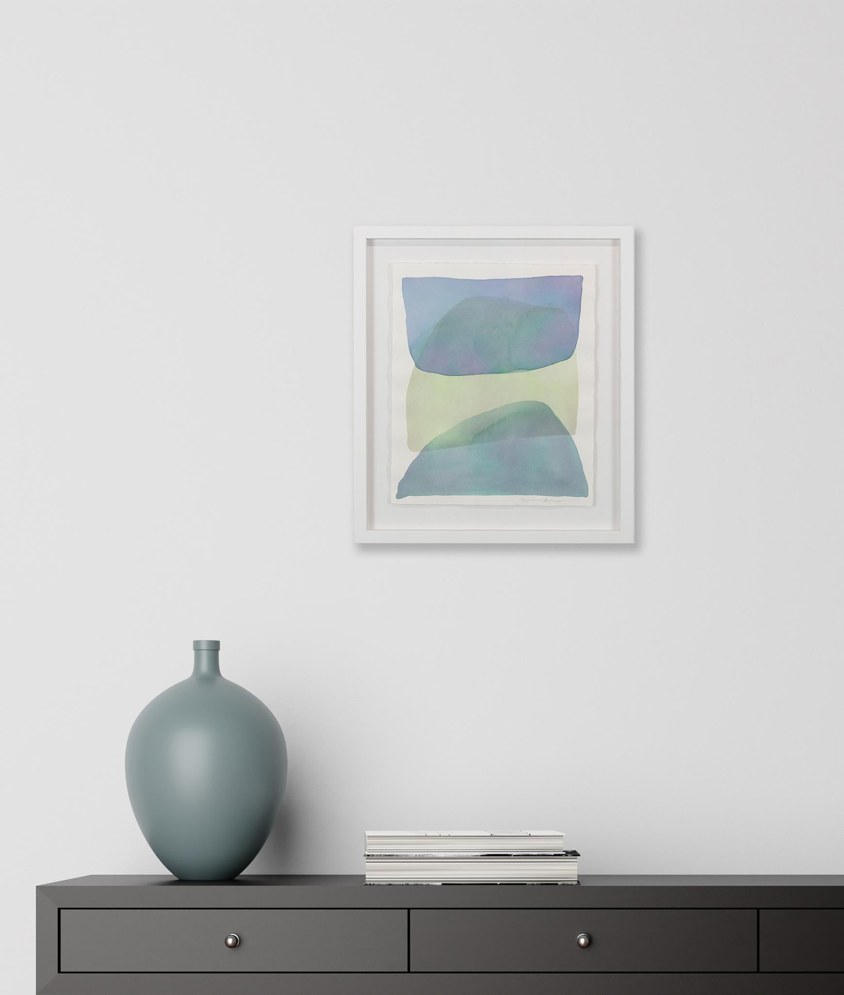 This original abstract watercolor painting by Nealy Hauschildt features a deep blue, green, and muted yellow palette, with organic planes of washy color applied in layers to create a stacked, organic, and abstract composition. The painting on paper