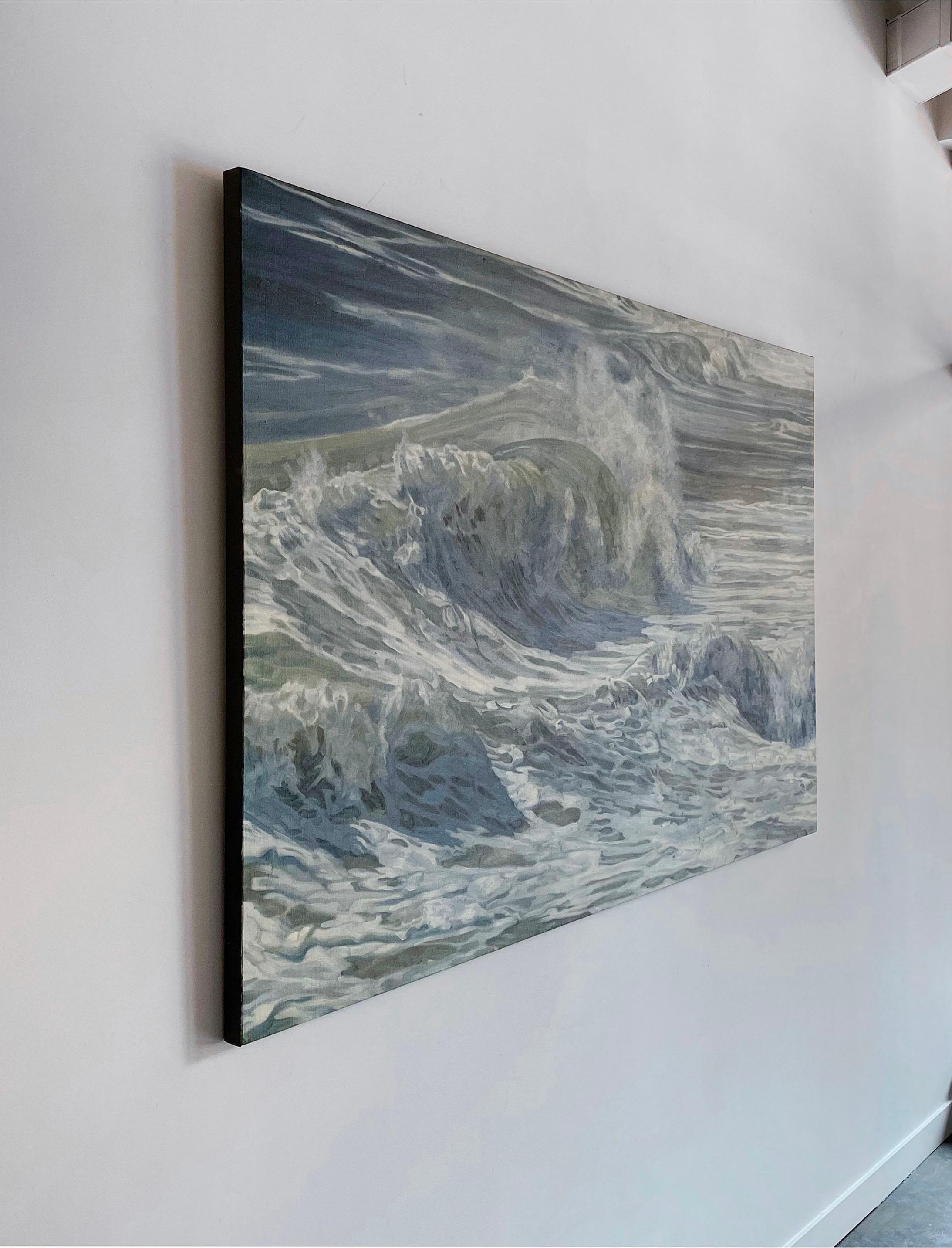 This large-scale, original oil painting by artist John Harris depicts a realistic view of rolling and crashing ocean waves. A highly detailed statement piece, it balances the weight of an ocean wave against spraying sea mist. Sea green, muted ocean