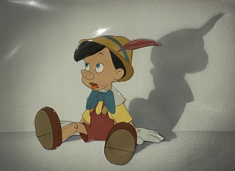 Walt Disney - Walt Disney Production Cel Pinocchio on a Courvoisier  Background from Pinocchio at 1stDibs | pinocchio background, pinocchio cel,  pinocchio green character