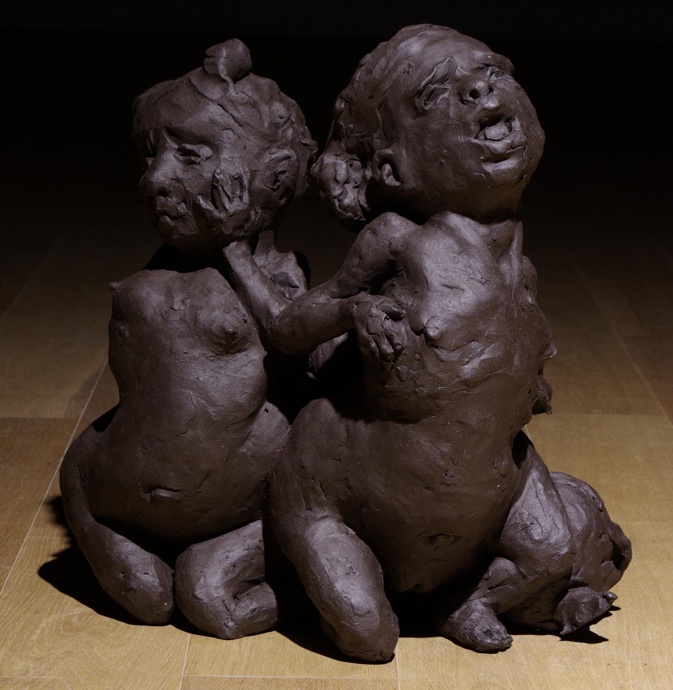 Anne Drew Potter Figurative Sculpture - GET OFF THE BOAT - contemporary nude ceramic sculpture in black earthenware