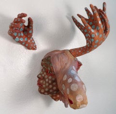 SCORN - surreal ceramic wall mounted sculpture of moose and woman