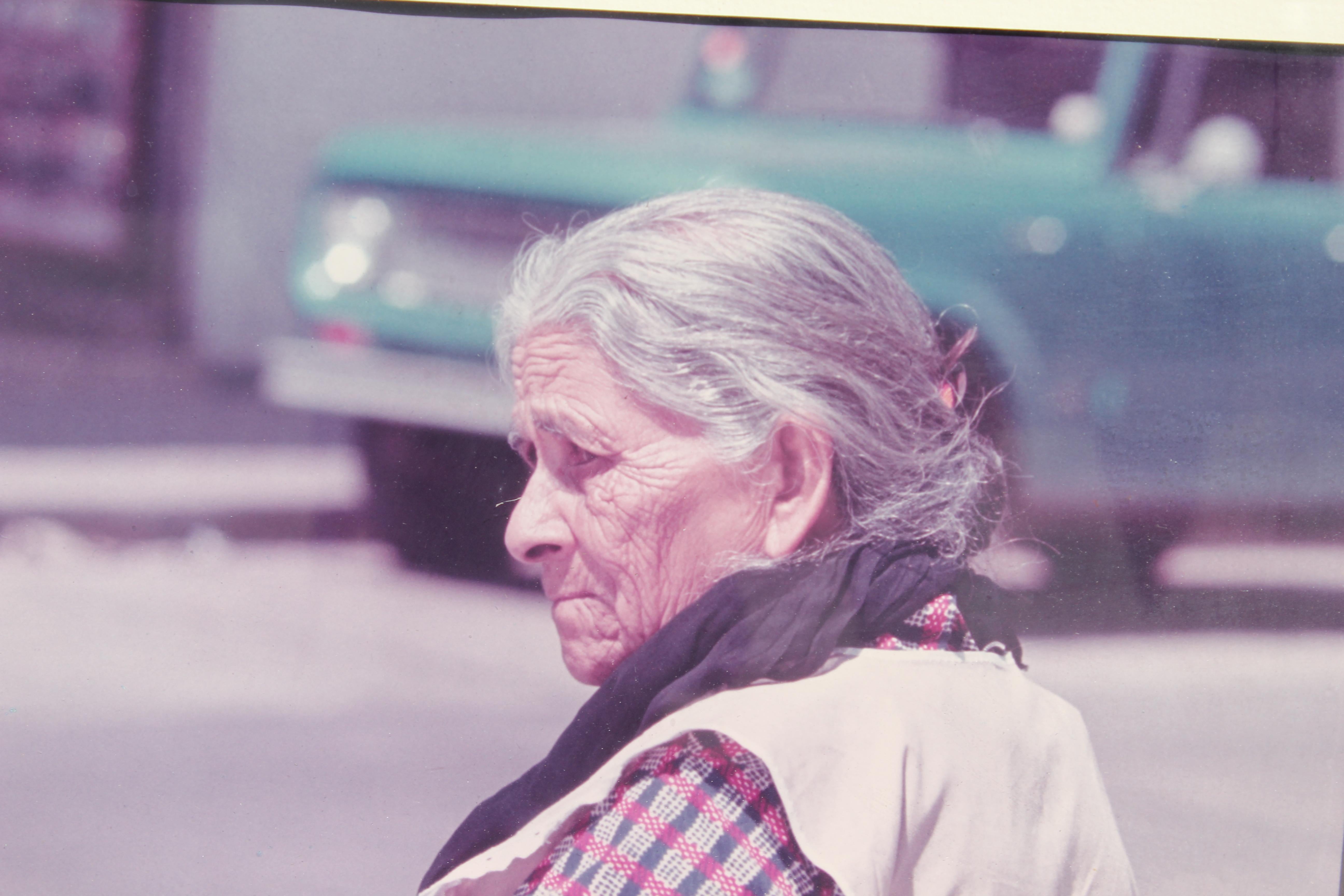 Elder Women Holding Toiletries - Photograph by Rodney Susholtz