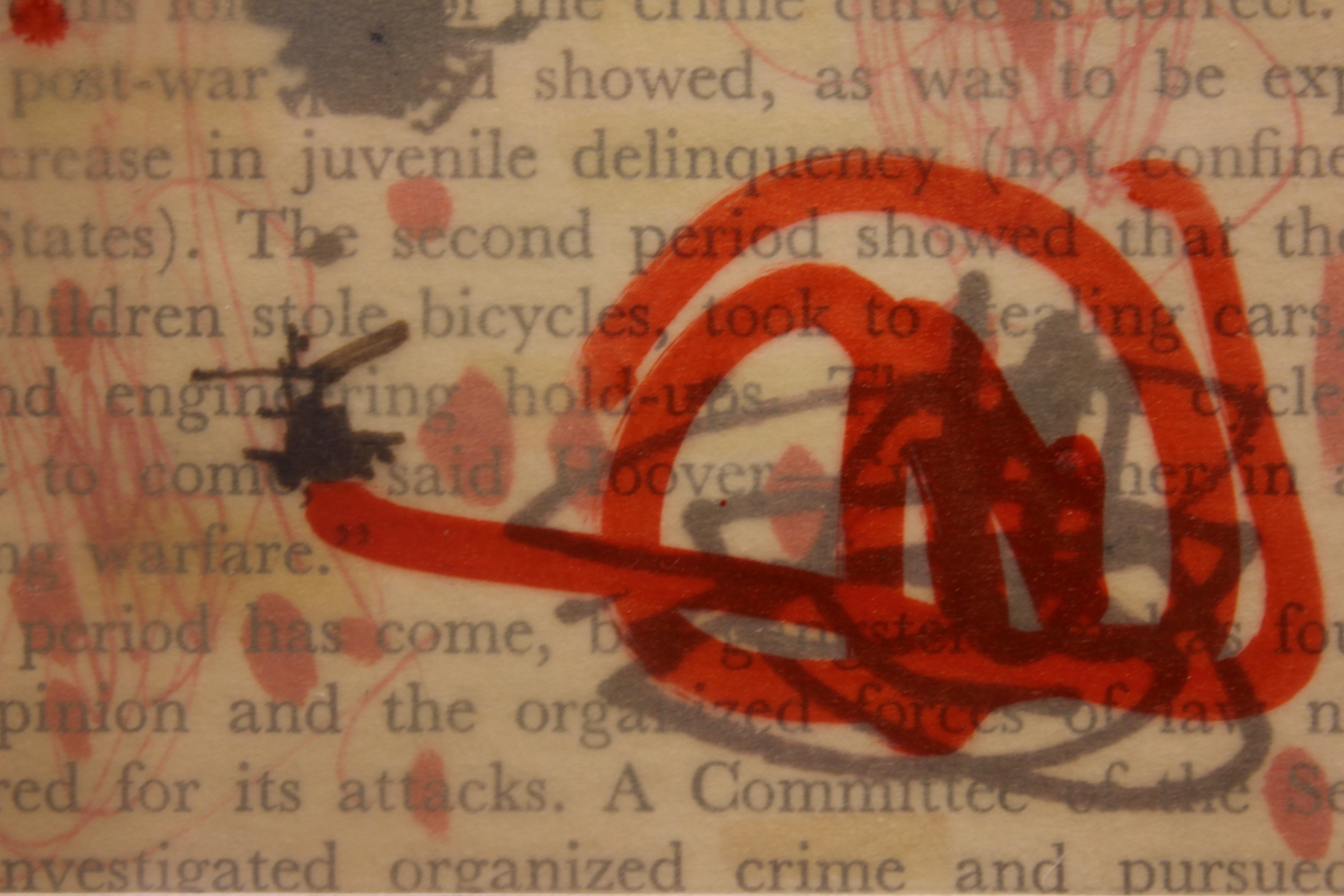 Critique politique du petit assemblage. L'œuvre est une découpe de papier journal d'un article intitulé 