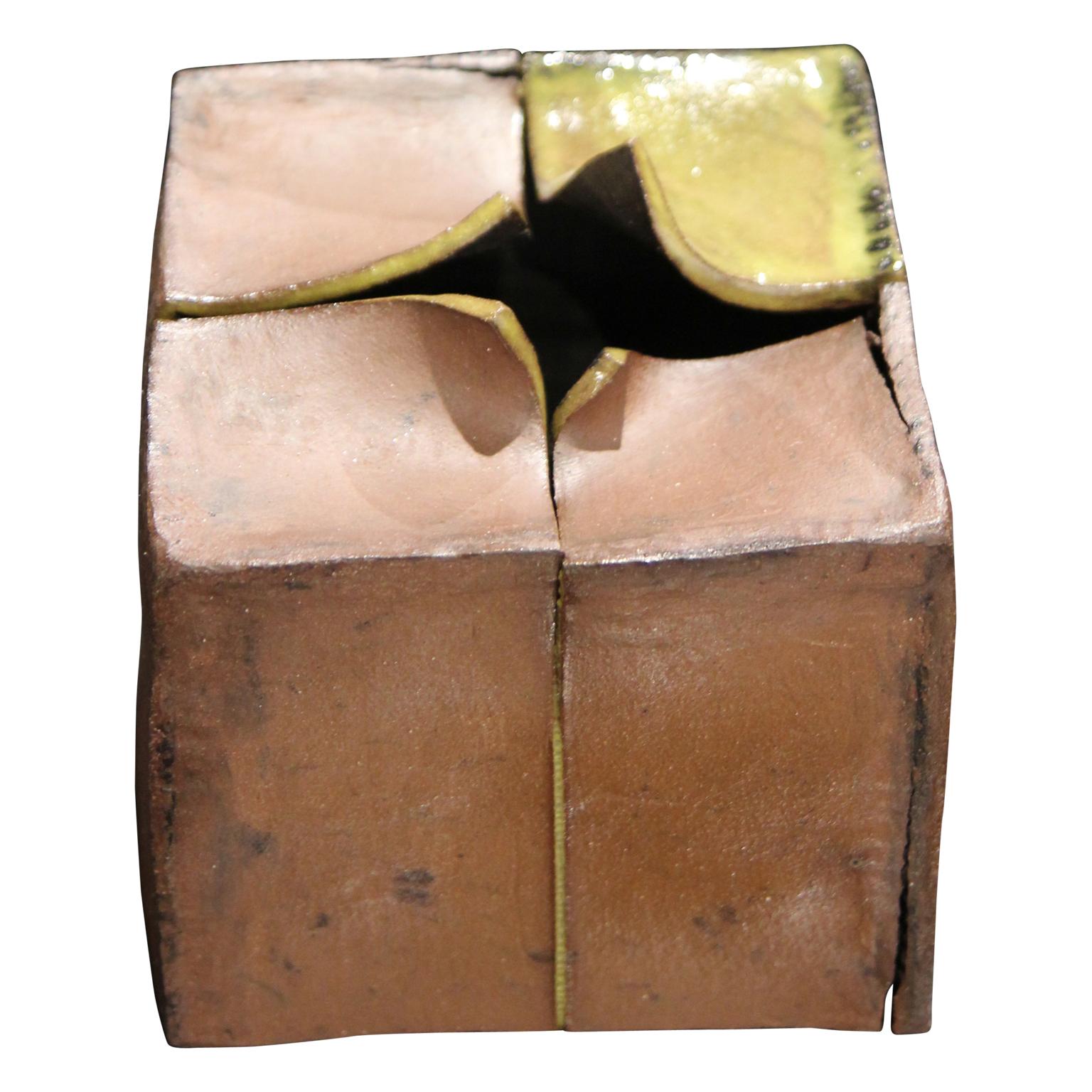 Minimalist style distressed ceramic box created by Houston Contemporary artist Josefina Barassi who is apart of the Glassel School of Art in Houston Texas. She intentionally creates her boxes to look torn open or falling in on itself. The sculpture