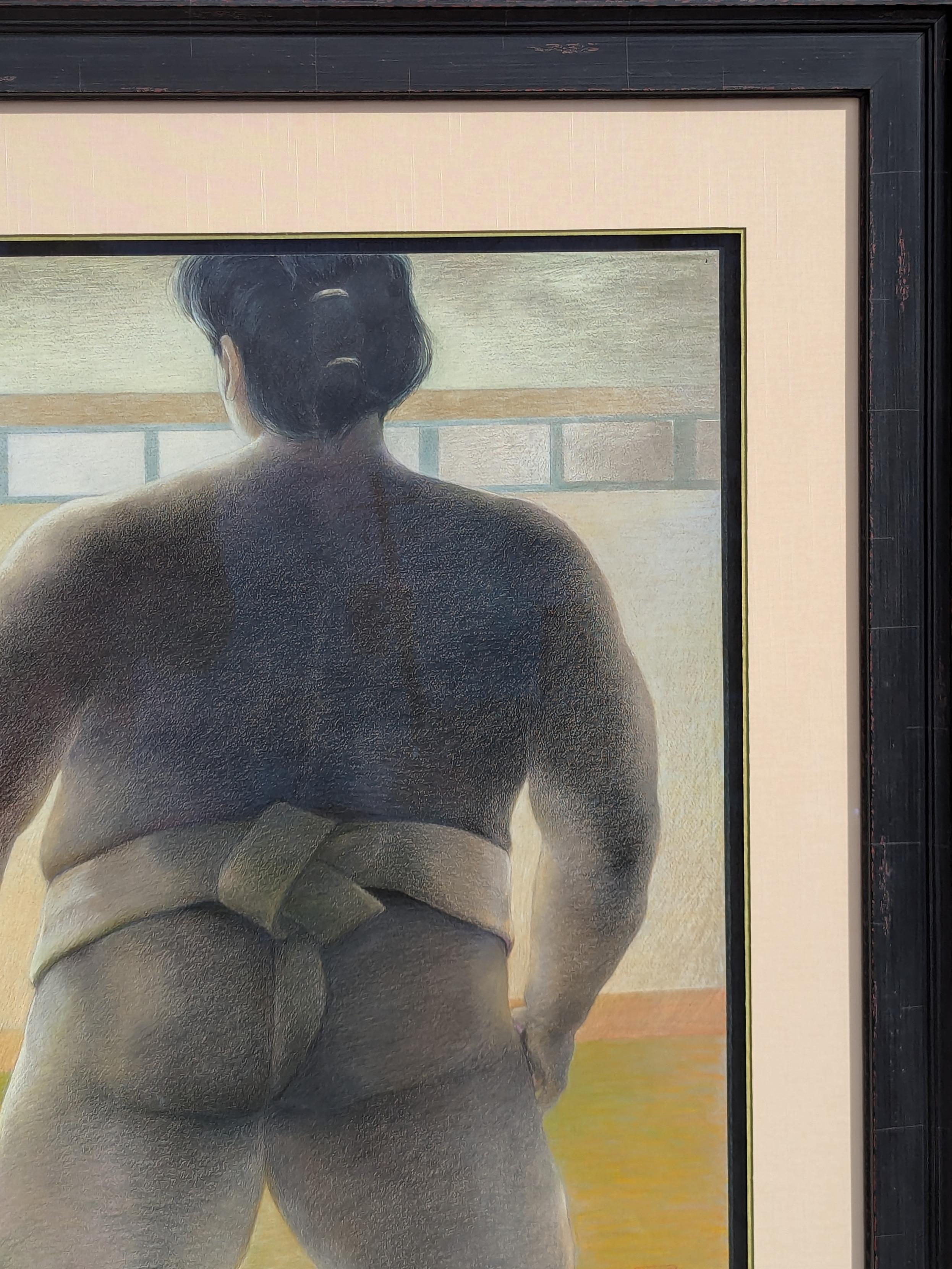 Modern pastel drawing of a sumo wrestler wearing a mawashi as he prepares for a match. Signed by the artist in the front lower right corner. Currently hung in a black frame with a light cream matting. 

Dimensions Without Frame: H 25.5 in. x W 19.5