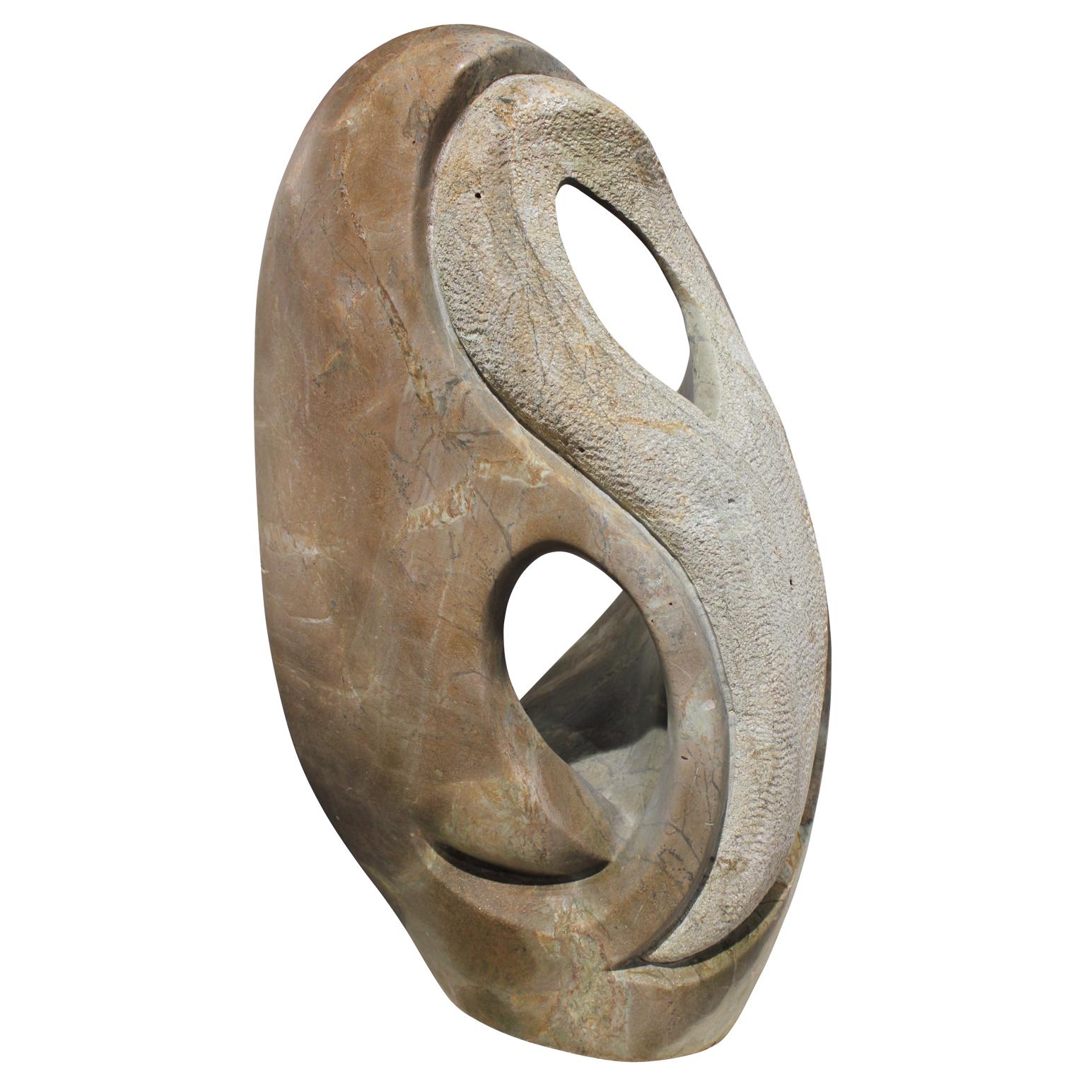 Large Organic Swirling Sculpture with Raw Natural Stone and Polished Stone - Brown Abstract Sculpture by Jose Zacarias