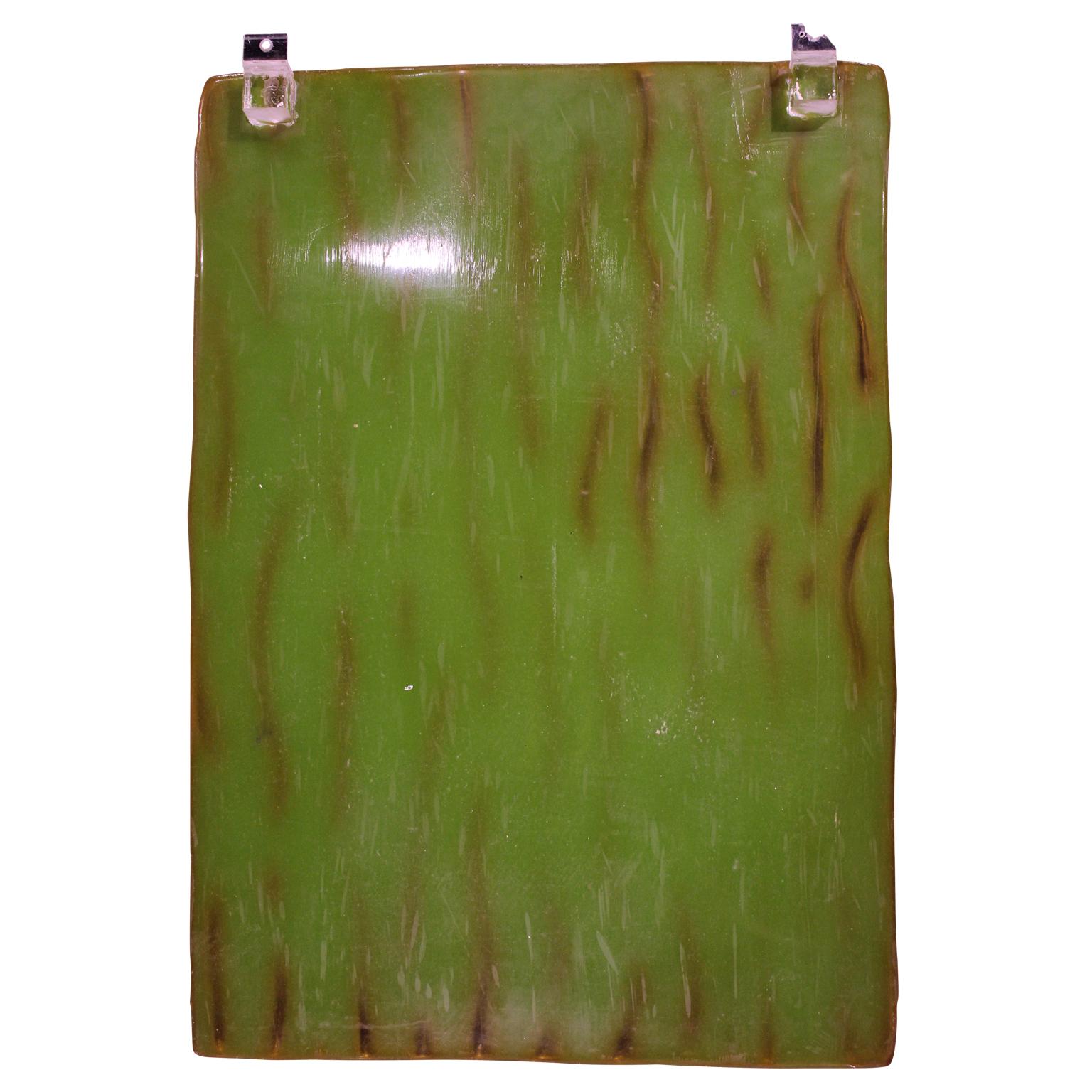 Urethane rubber wall sculpture that has a wavy texture. The works are apart of the 