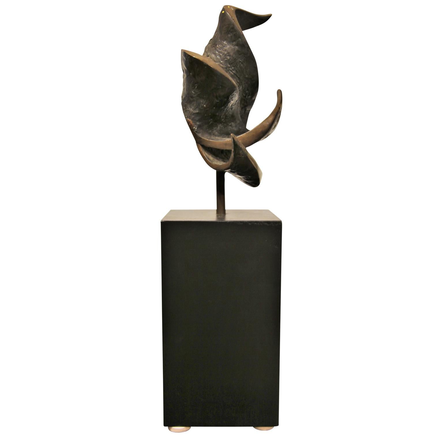 W. R. Stevenson's abstract bronze sculpture that stands on a sleek black wooden base. This piece is an excellent example of W. R. Stevenson's work as a sculptor. 

Artist Biography: William Robert Stevenson was born in 20 May 1925 in Eugene, Oregon.