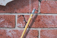 Modern Realist Still Life Study of a Brick Wall, Pins and Pencil