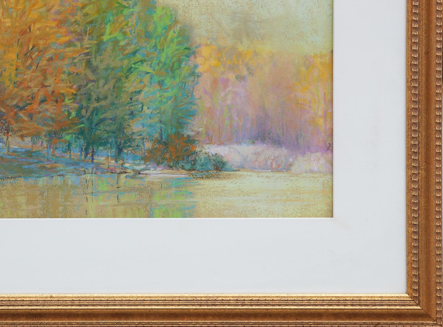 Abstract impressionist oil pastel landscape by Colorado artist, Ken Elliott. Yellow and green pastel toned drawing depicting a lakeside with glowing trees in autumn. Framed and matted in a gold frame. Signed by artist at the bottom left.

Dimensions