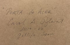 Porta d'Acer - Ancient Architecture and Striking Blue Door Amidst Lush Landscape