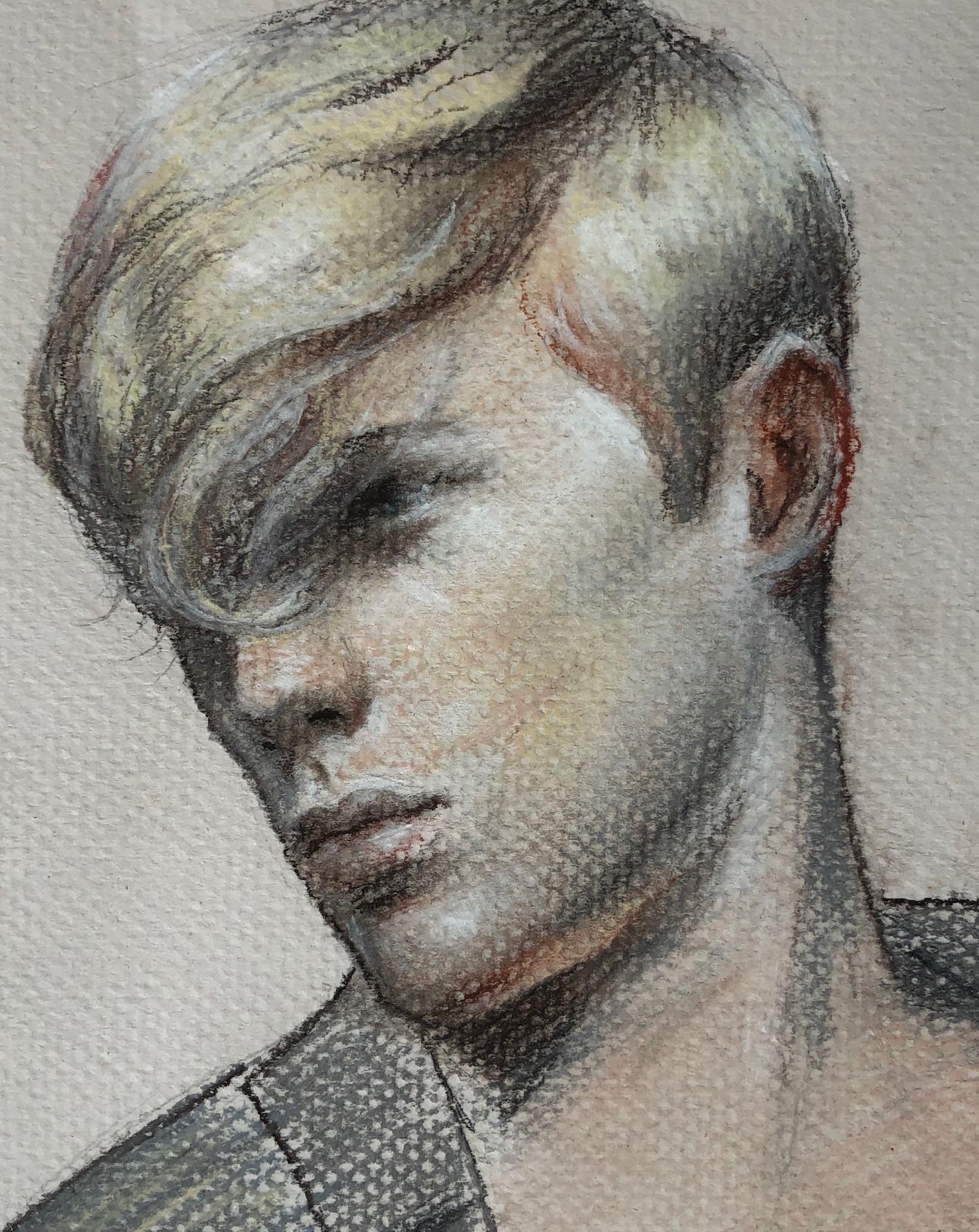 blond boy drawing