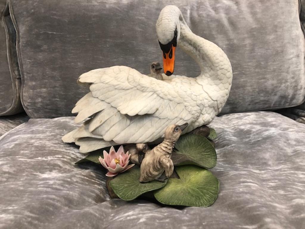 Pair of Boehm Porcelain Swans
   Edward Marshall Boehm (August 21, 1913 – January 29, 1969) was an American figurative expressionist sculptor, known for his porcelain figures of birds and other wildlife. Boehm explained his choice of porcelain as