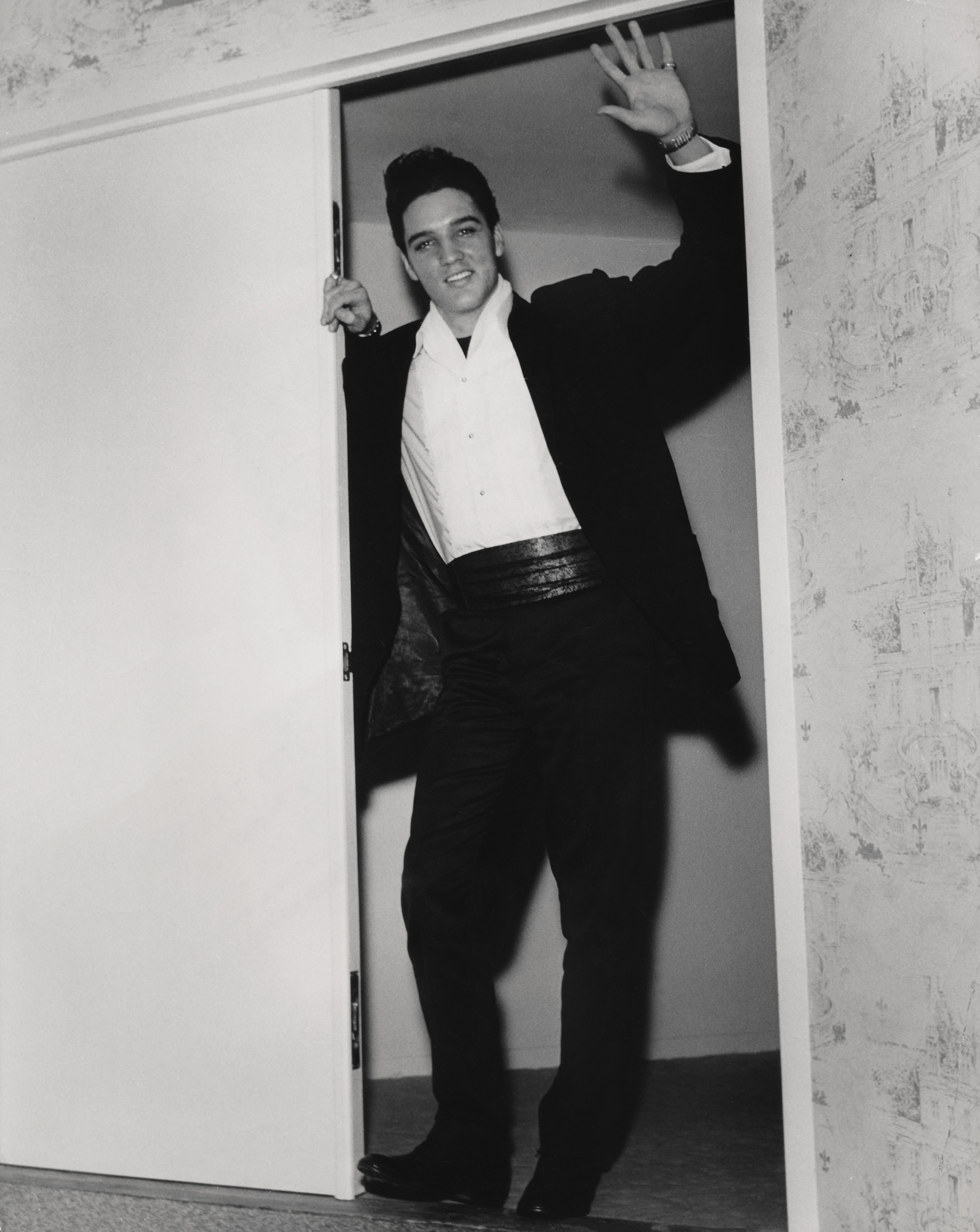 Toby Massey Black and White Photograph - Elvis Presley Waving in Doorway Fine Art Print