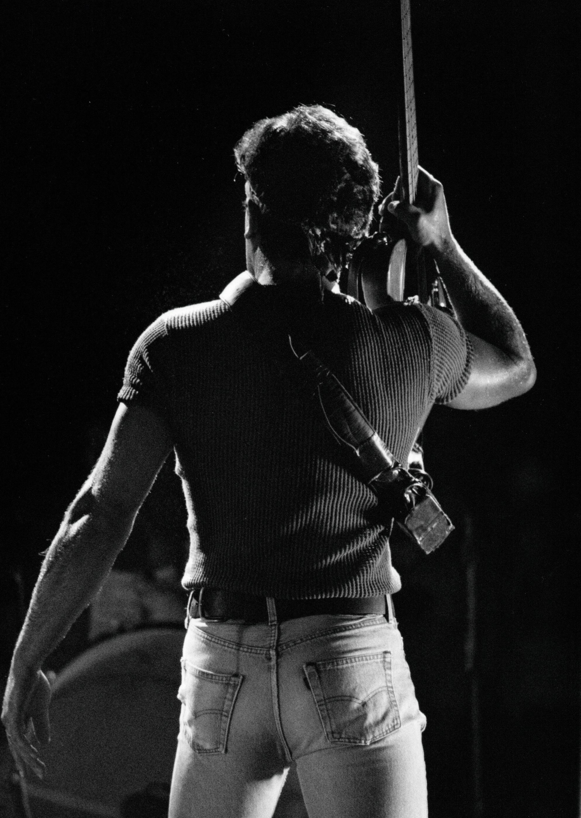 Rocky Widner Black and White Photograph - Bruce Springsteen Silhouette on Stage Vintage Original Photograph