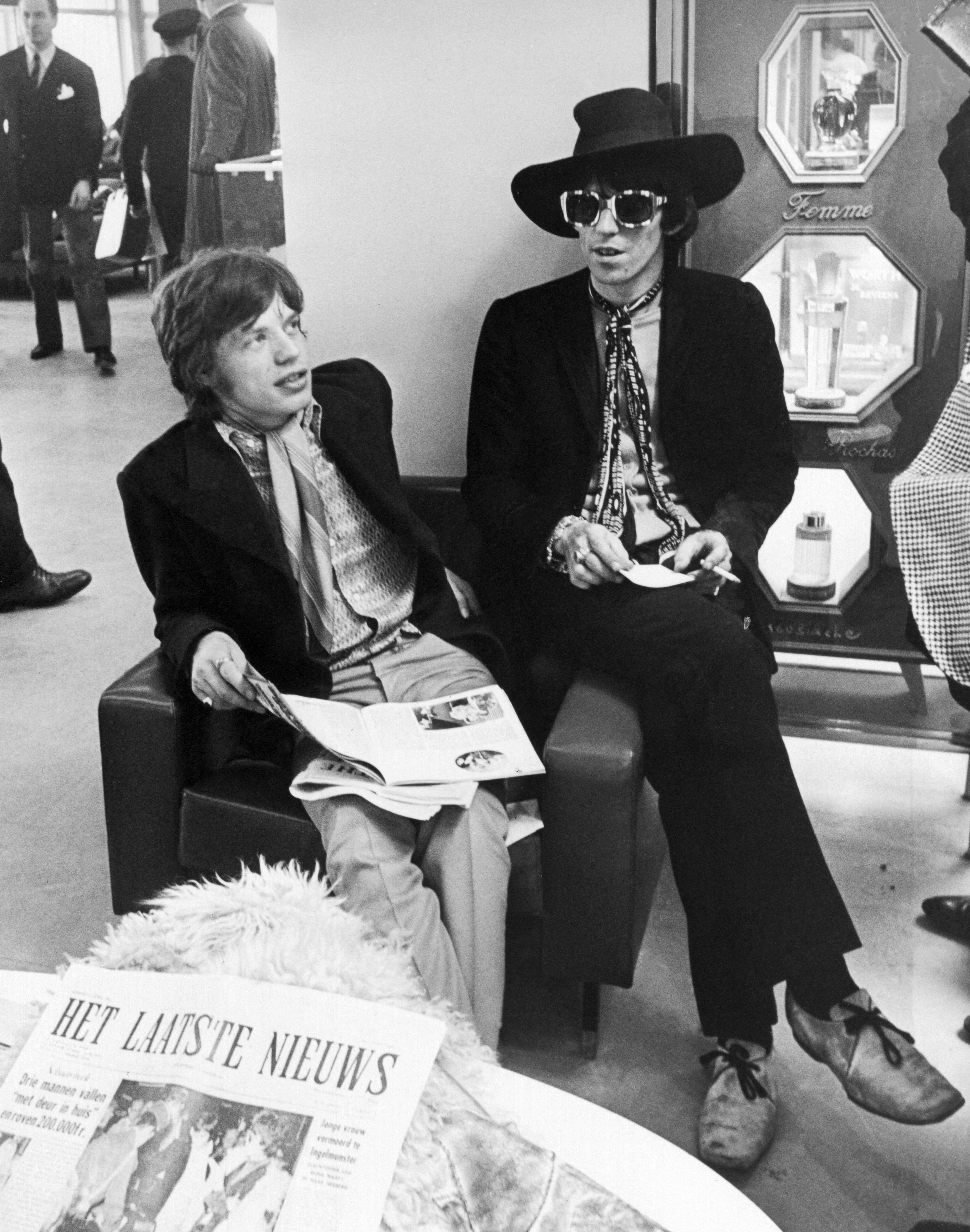 Roy Cummings Black and White Photograph - Mick Jagger and Keith Richards Candid with Newspaper Globe Photos Fine Art Print