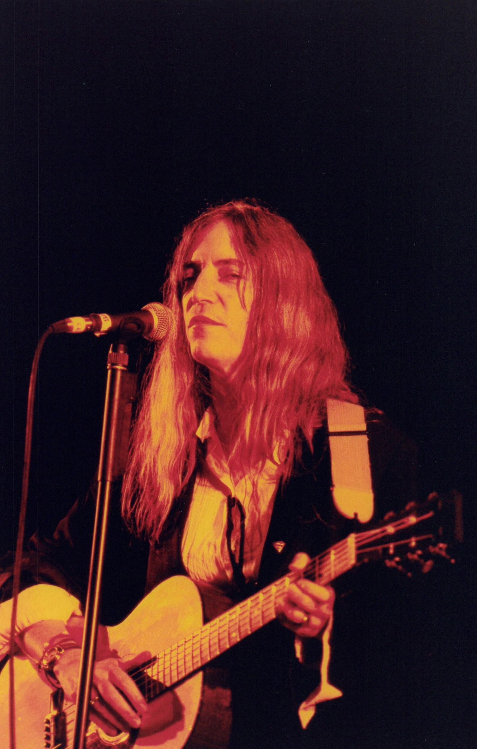 Gie Knaeps Color Photograph - Patti Smith Performing in the Spotlight Vintage Original Photograph