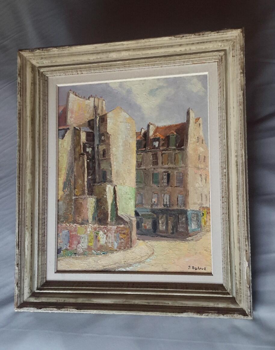 Beautiful oil on panel post-Impressionist style of the 50s representing a view of Paris in the 5th district of Mouffetard. The painting is signed J Baloue at the bottom right. It is accompanied by its old wooden frame.
A charming painting executed