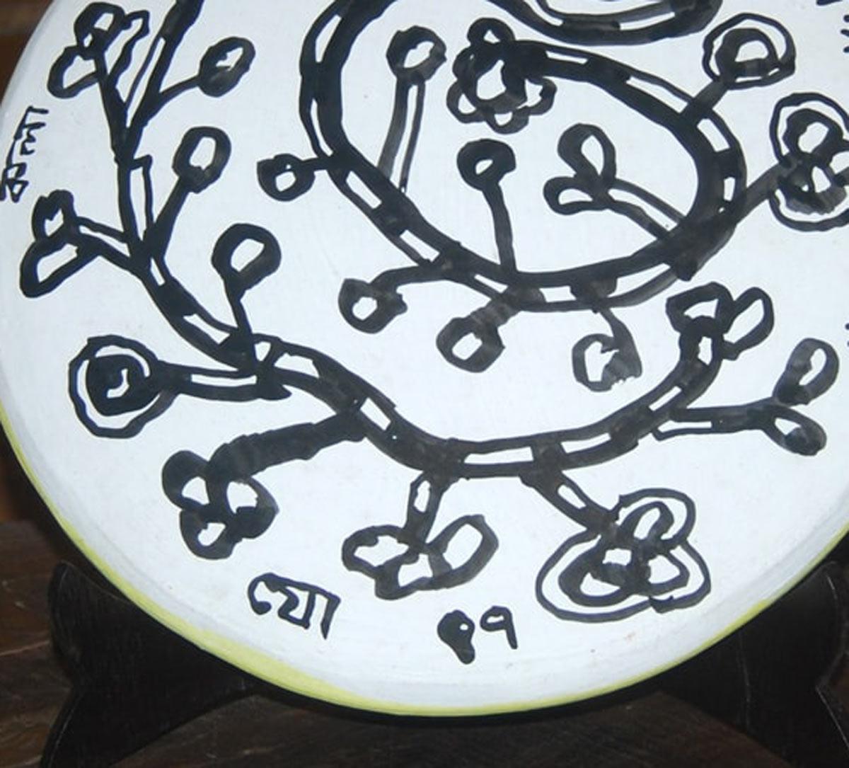 Jogen Chowdhury - Untitled - 12 diameter 
Teracotta. Signed in bengali.

Always a powerful artist, Chowdhury developed his individual style after his return from France in the late '60s. Although Chowdhury has painted oils, his forte is painting in