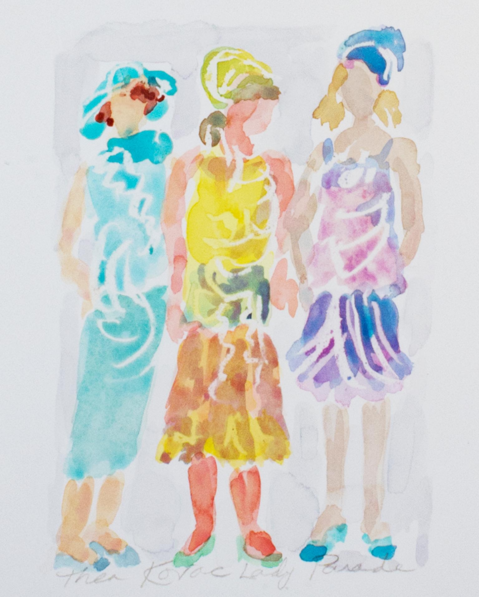 "Lady Parade II" watercolor by Thea Kovac. The artist signed and titled the piece below the image. The piece features three women standing in brightly colored dresses. 

8 3/4" x 6" art
19" x 15 1/4" frame

THEA KOVAC is a visual artist, writer,