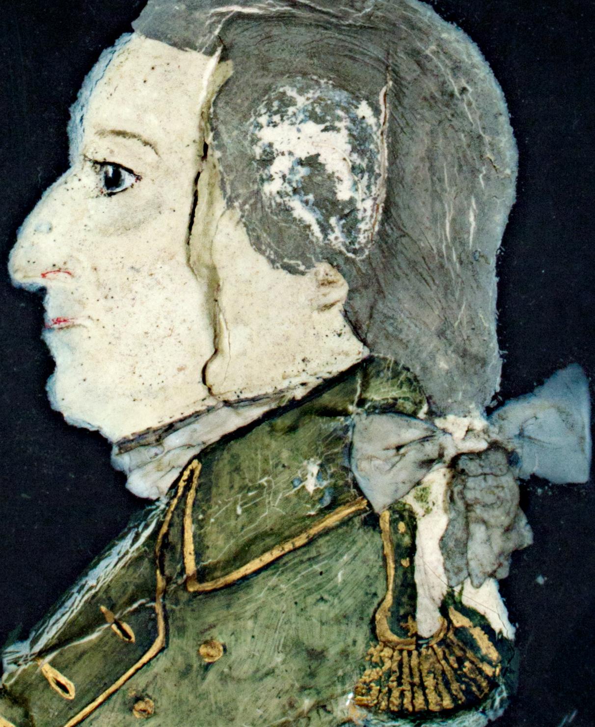 This profile portrait of George Washington is a wax relief in an early antique birdseye maple frame, signed and dated as by George Rouse. Rouse is either the actual name or the alias of a forger creating wax busts of the first American president in