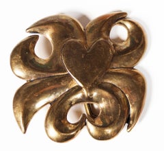 "Sun and Heart" brass belt buckle signed by Carol Summers