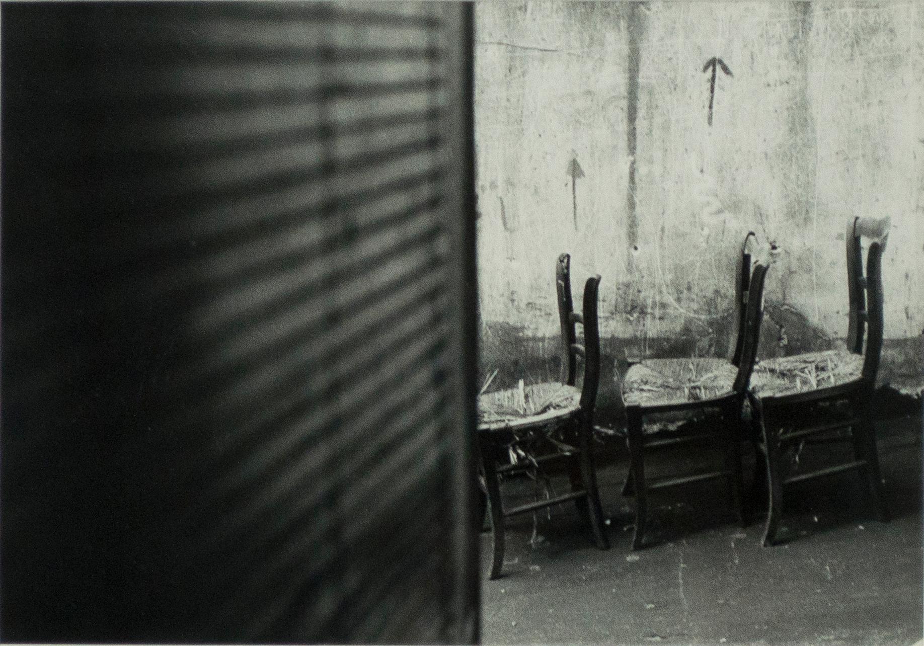 This image of empty broken chairs in a deserted alley is reminiscent of the work of Eugene Atget, who was capturing the streets of Paris over a 30 year period at the beginning of the 20th century. His work was highly prized by the surrealists who