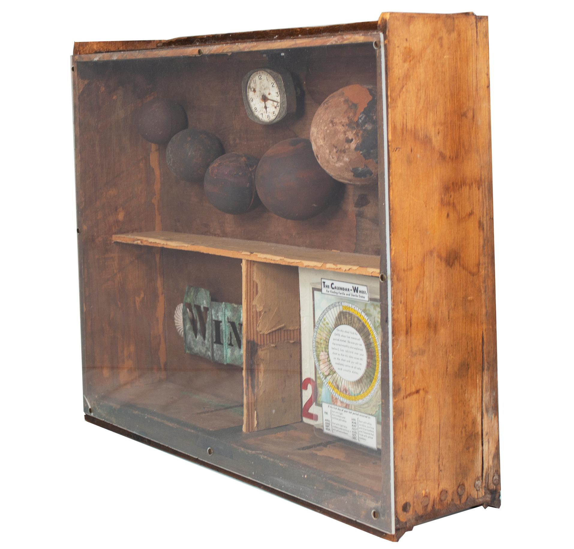 'The Calendar Wheel' assemblage in drawer with spheres clock shells cards - Sculpture by Charles Berg